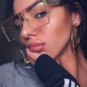 Oversized clear lens gold frame sunglasses